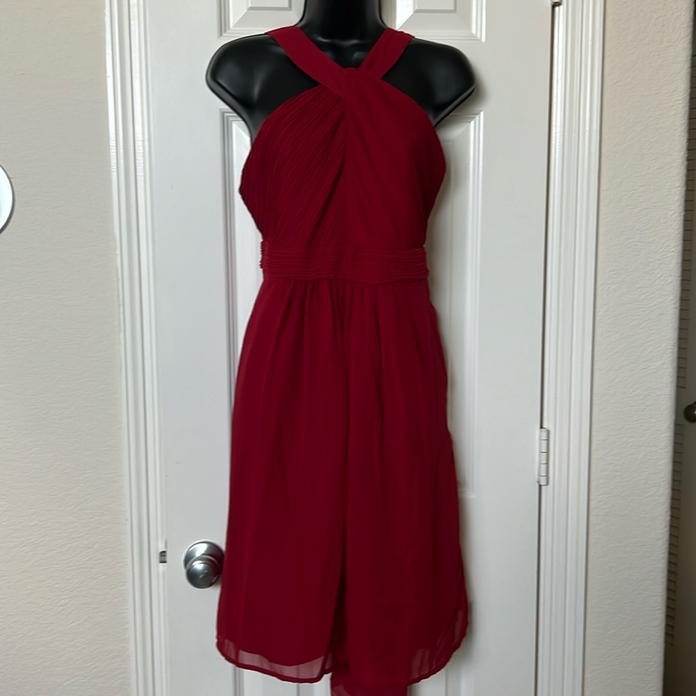 Red halter style dress with pockets. Size 12